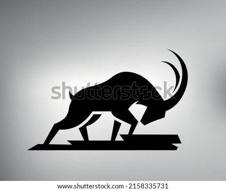 sketch of a tribal mountain goat tattoo. mountain goat logo. vector drawing goat threatens with its horns Royalty-Free Stock Photo #2158335731