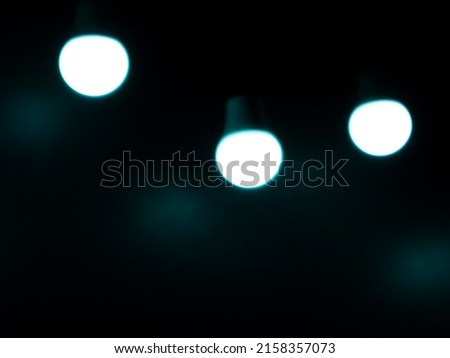 Open Light bulb on black background.add blue color