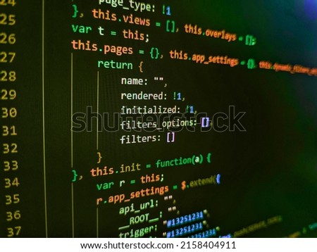Abstract computer script  code. Software background technology. HTML CSS3 source code on lcd screen with black background. Monitor closeup of function source code
