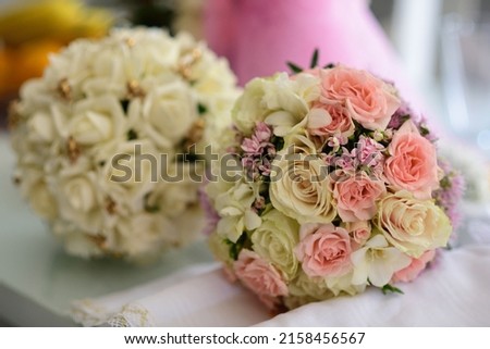 A selective focus shot of bouquets of fresh flowers on the table