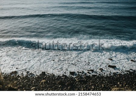An aerial shot of a beautiful sea on a sunny day