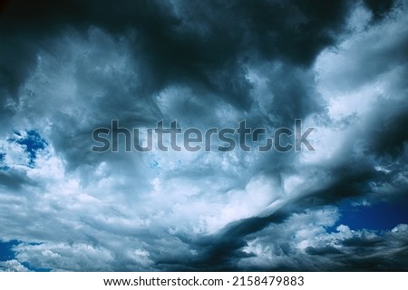 Dark Storm Cloudy Rainy Sky With Rain Heavy Clouds. Sky Natural Background. Weather Forecast Concept. heavy raging turbulent cloudscape. vortical clouds. Strange Clouds Cloud Sky Moving In Cloudy. bad