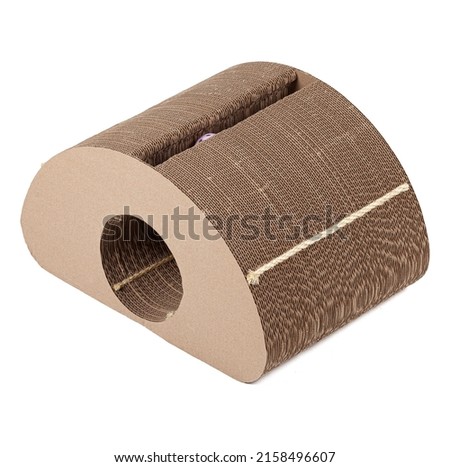Cardboard scratching post for cats on a white background.