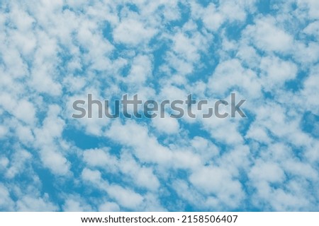 Beautiful blue cloudy sky. Background photo texture.