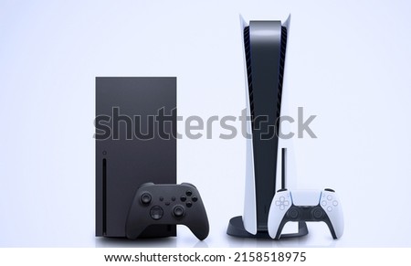 Black and white console games with controllers. Royalty-Free Stock Photo #2158518975