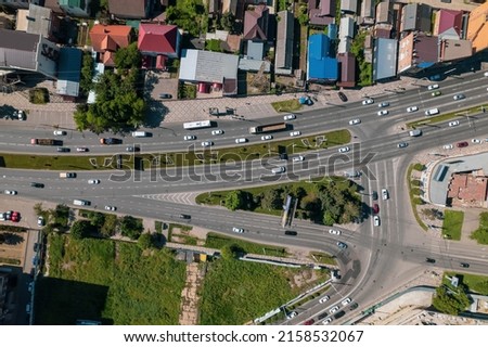 Aerial top down view of road bridge with traffic, road infrastructure. Resolving of car traffic jam.