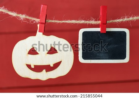 Wooden pumpkin hanging on rope with old photo,Halloween decoration