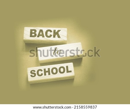 Back to school words on wooden cubes. Education concept.