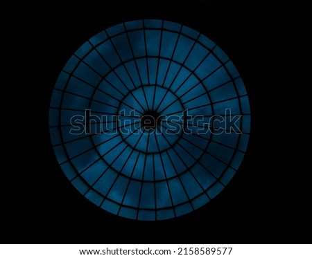 Looking up at a Dome Ceiling showing dark clouds Royalty-Free Stock Photo #2158589577