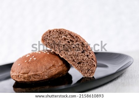 Chocolate choco burger buns with sesame set with copy space for text	
