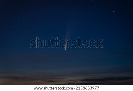 A view of falling star in a dark sky Royalty-Free Stock Photo #2158653977