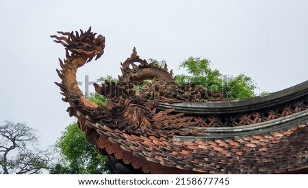 Dragon Sculpture On The Roof Of A In Lam Kinh, Vietnam.