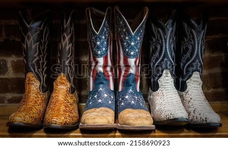 A closeup of Cowboy boots decorated with the American flag on sale in shops in downtown Nashville, Tennessee Royalty-Free Stock Photo #2158690923