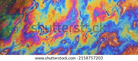 abstract background gasoline art colored, texture oil multicolored rainbow abstract gasoline spill Royalty-Free Stock Photo #2158757203