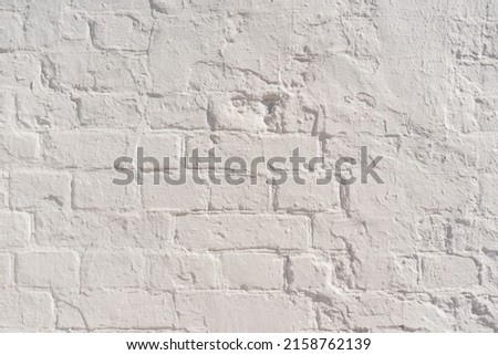 Old white brick wall. Clouseup background.