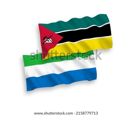 National vector fabric wave flags of Republic of Mozambique and Sierra Leone isolated on white background. 1 to 2 proportion.