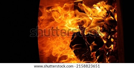 A closeup of a burning fireplace
