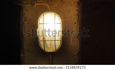 A photo of an old wall lamp