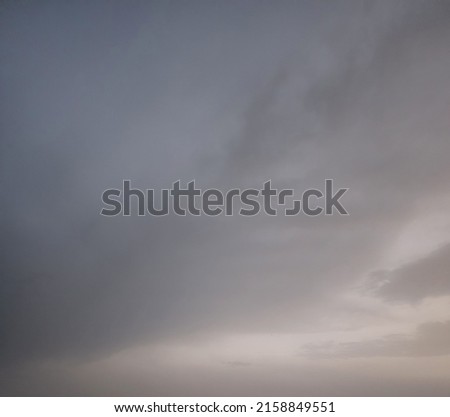 Evening view with dark Black Clouds,  Yellow light 