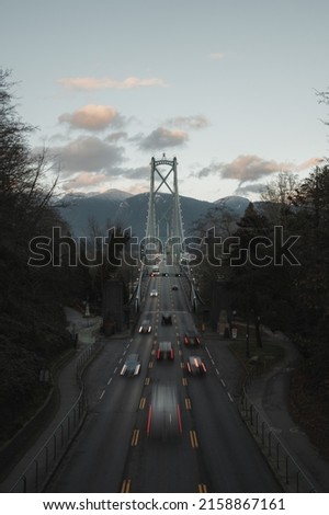 A high angle shot of the busy Lions Gate Bridge in Vancouver