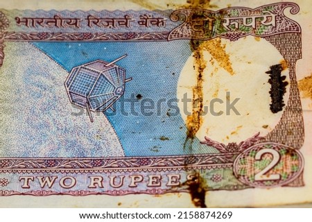 Old Two Rupee notes combined on the table, India money on the rotating table. Old Indian Currency notes on a rotating table, Indian Currency on the table Royalty-Free Stock Photo #2158874269