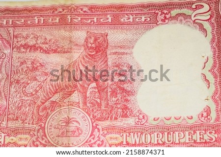 Old Two Rupee notes combined on the table, India money on the rotating table. Old Indian Currency notes on a rotating table, Indian Currency on the table Royalty-Free Stock Photo #2158874371