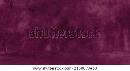 Old shabby concrete wall texture with cracked purple concrete studio wall. Abstract grunge background. Product presentation.