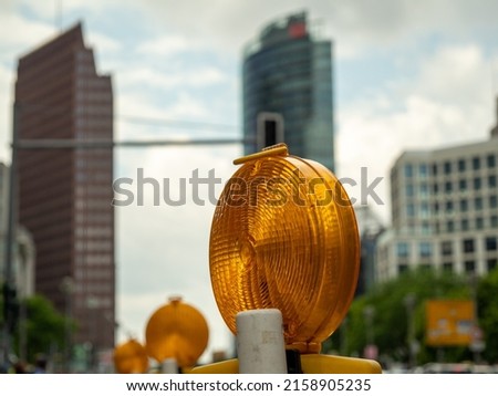 Construction warning lamp. Yellow building lantern.