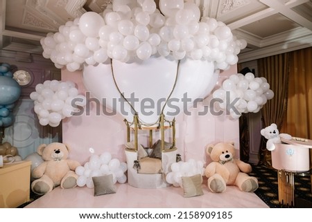 Pink photo zone with balloons and teddy bears, one year birthday party rich decorated Royalty-Free Stock Photo #2158909185