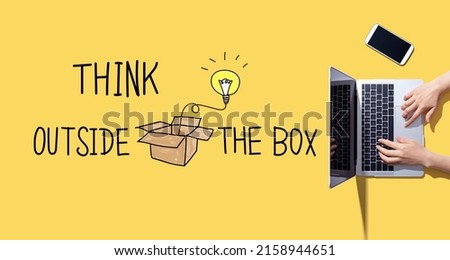 Think outside the box with person working with a laptop