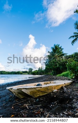 An abandoned boat on the Hawaii coastline