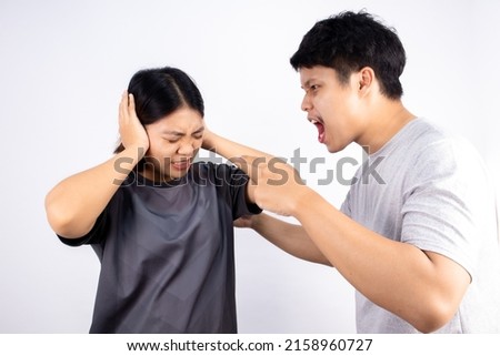 The unhappy couple quarreled violently to the point of physical abuse and the woman was under severe stress. Royalty-Free Stock Photo #2158960727