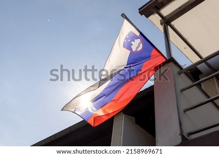Slovenia national flag waving in the wind with sun s