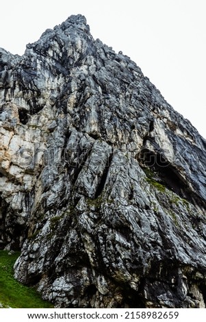 A vertical shot of a great rock in Kreuzeck, Germany Royalty-Free Stock Photo #2158982659
