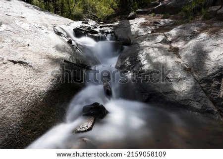 A beautiful view of water flowing over the rocks