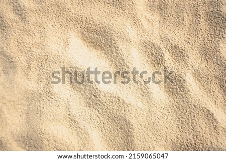 Golden sand top view texture beach clean background Brazil. Sand nature shore dune daytime. Photo shoot full frame shot. Close up good sand pattern sunshine. space 2022.