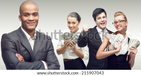 team of young successful business people standing over gray background