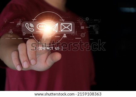 Concept Contact us or connected customer support hotline. businessman touching icon to communicate on a virtual screen,through a digital, global network. Icon (Email,Live Chat,Internet,Phone, Message)