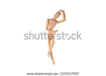 wooden man dancing isolated on white background. High quality photo