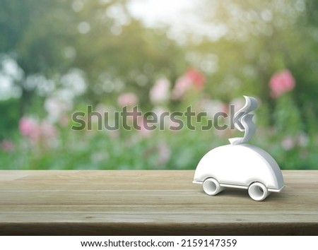 Restaurant cloche 3d icon on wooden table over blur pink flower and tree in garden, Business food delivery online concept
