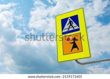 Traffic sign pedestrian crossing and attention to children, close up