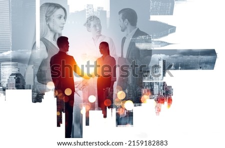 Silhouettes of business people working together, man and woman handshake and partners talking, double exposure of financial skyscrapers, toned image. Concept of conference Royalty-Free Stock Photo #2159182883