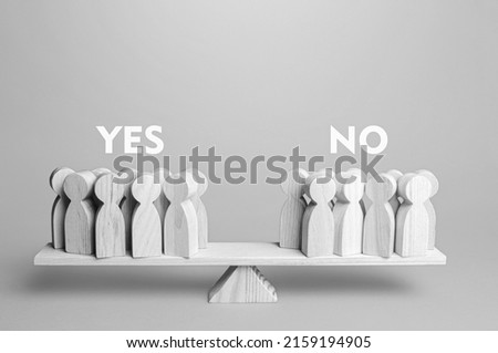 Voting yes or no. People are divided in opinion on the scales. Advantages and disadvantages. Political democratic elections. Divide into opposing factions. Public question. Referendum. Exit poll. Royalty-Free Stock Photo #2159194905