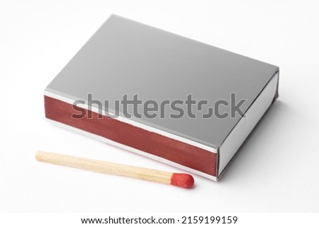 Burnt matches isolated on white. Box of matches. Different stages of match burning Burnt matches.  Royalty-Free Stock Photo #2159199159
