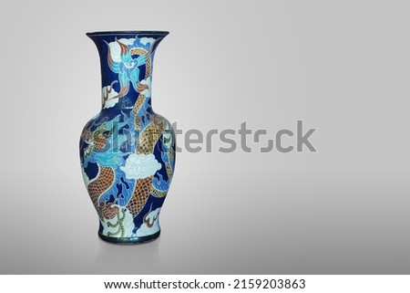 old and antique blue big ceramic vase on grey background, object, vintage, retro, copy space Royalty-Free Stock Photo #2159203863