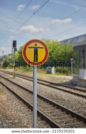 Geilenkirchen-NRW-Deutschland-05.22.2022: caution sign for pedestrians at the train station
