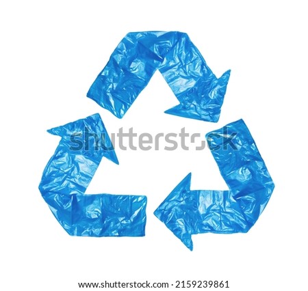 The sign of recycling created by a blue garbage bag