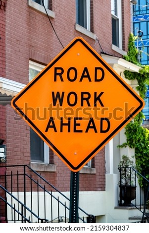 Road Work Ahead Sign on a street
