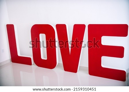 Love statue on the white background