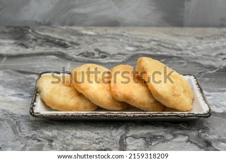 A closeup shot of deep-fried doughs